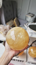 Load and play video in Gallery viewer, Large Honey Calcite Sphere - 2.08kg #126