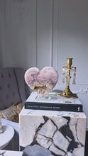 Cargar y reproducir el video en el visor de la galería, Large Pink Amethyst Heart on Clear Stand - Half Raw Half Polished 2.5kg #15
